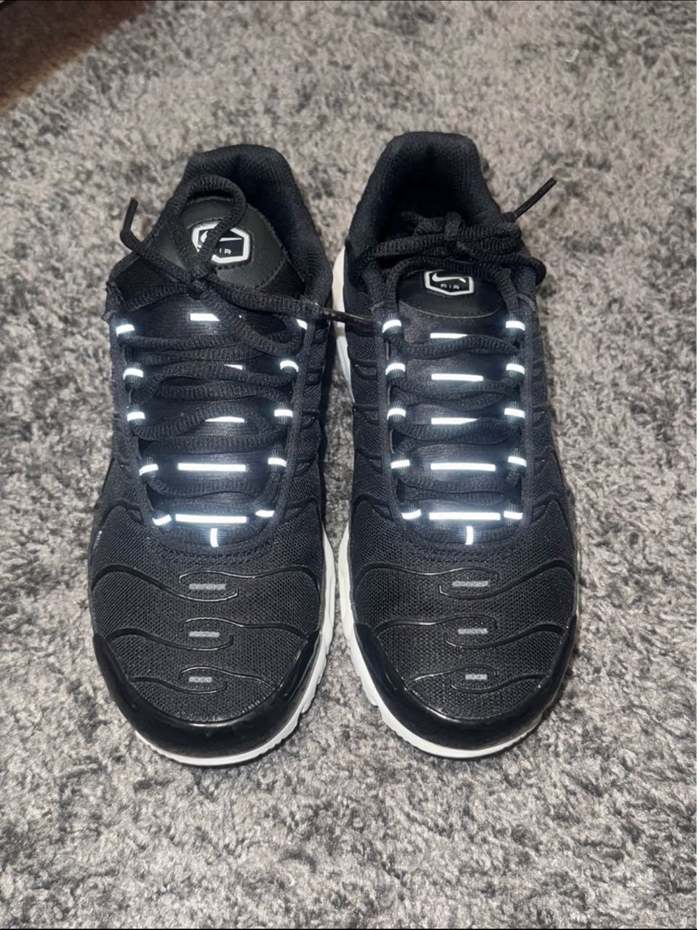 Nike Women’s Black and White Reflective Lace Sneakers